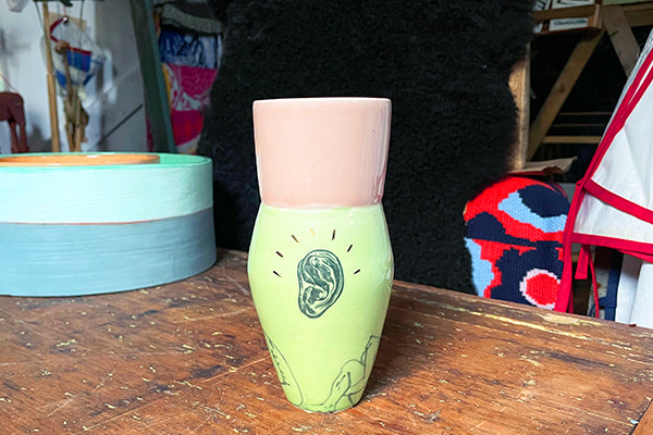 Gold Lustered Image Vase with Eye Ear Tooth by Luster Hustler Aidan Fraser Bodies Midcoast Maine Artisan Store The Good Supply Pemaquid Made in USA