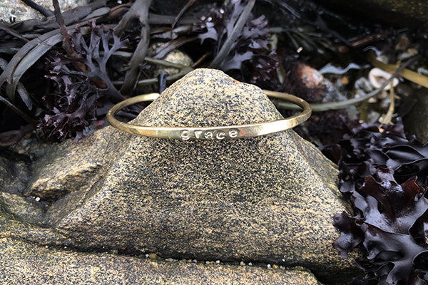 Grace Cuff Bracelet hand forged and stamped in Red Brass by Loving Anvil Midcoast Maine Artisan Store The Good Supply Pemaquid Made in USA