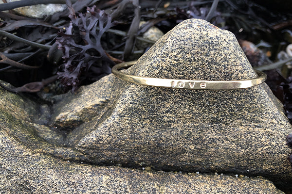 Love Cuff Bracelet hand forged and stamped in Red Brass by Loving Anvil Midcoast Maine Artisan Store The Good Supply Pemaquid Made in USA