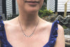 The Good Supply in Pemaquid Maine Textile Artist Erica Schlueter of Bent Metal Crocheted Shile Thread and Sterling Silver Jewelry Triangle Shards Necklace in Gray Made in USA