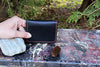Bifold Leather Wallet Handmade and Handstitched by Veteran Rick Elder of Great Story Works Midcoast Maine Artisan Store The Good Supply Pemaquid Made in USA Black with Red Stitching