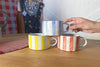 Striped Yellow Red Blue Glaze Mugs Ceramic by Alice Nasto Fresh Maine Art Midcoast Maine Artisan Store The Good Supply Pemaquid Made in USA